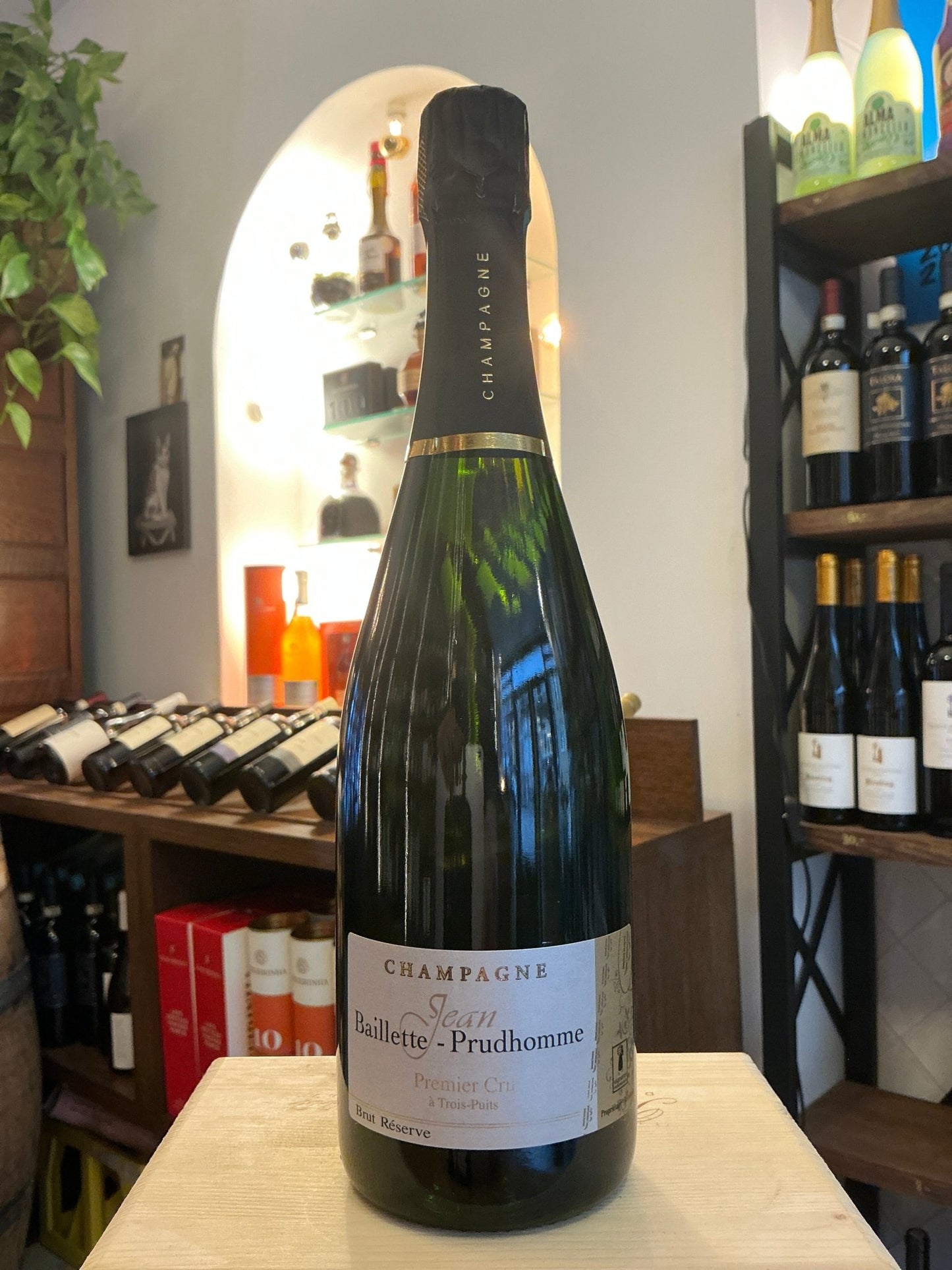 Baillette - Prudhomme 75cl premium champagne bottle with dark green glass and elegant label, specialty artisan spirit.