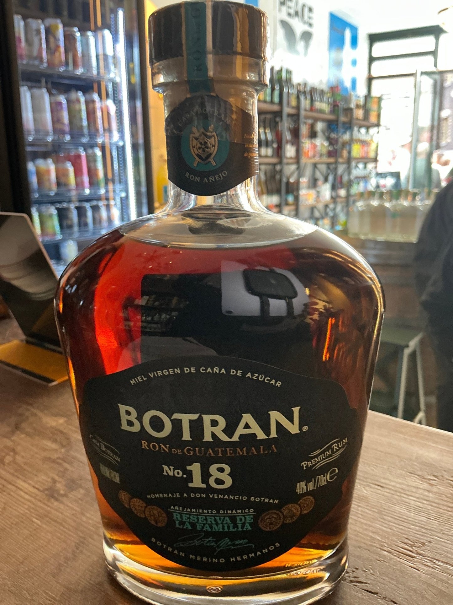 Botran 18 Year Old Solera Rum bottle with amber aged rum, black and gold label, premium artisan small batch specialty spirits.