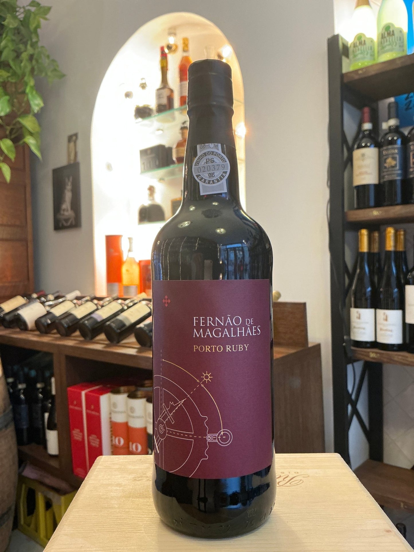 Fernão de Magalhães Port Ruby bottle with deep red label, artisan Portuguese fortified wine, premium ruby port, specialty.