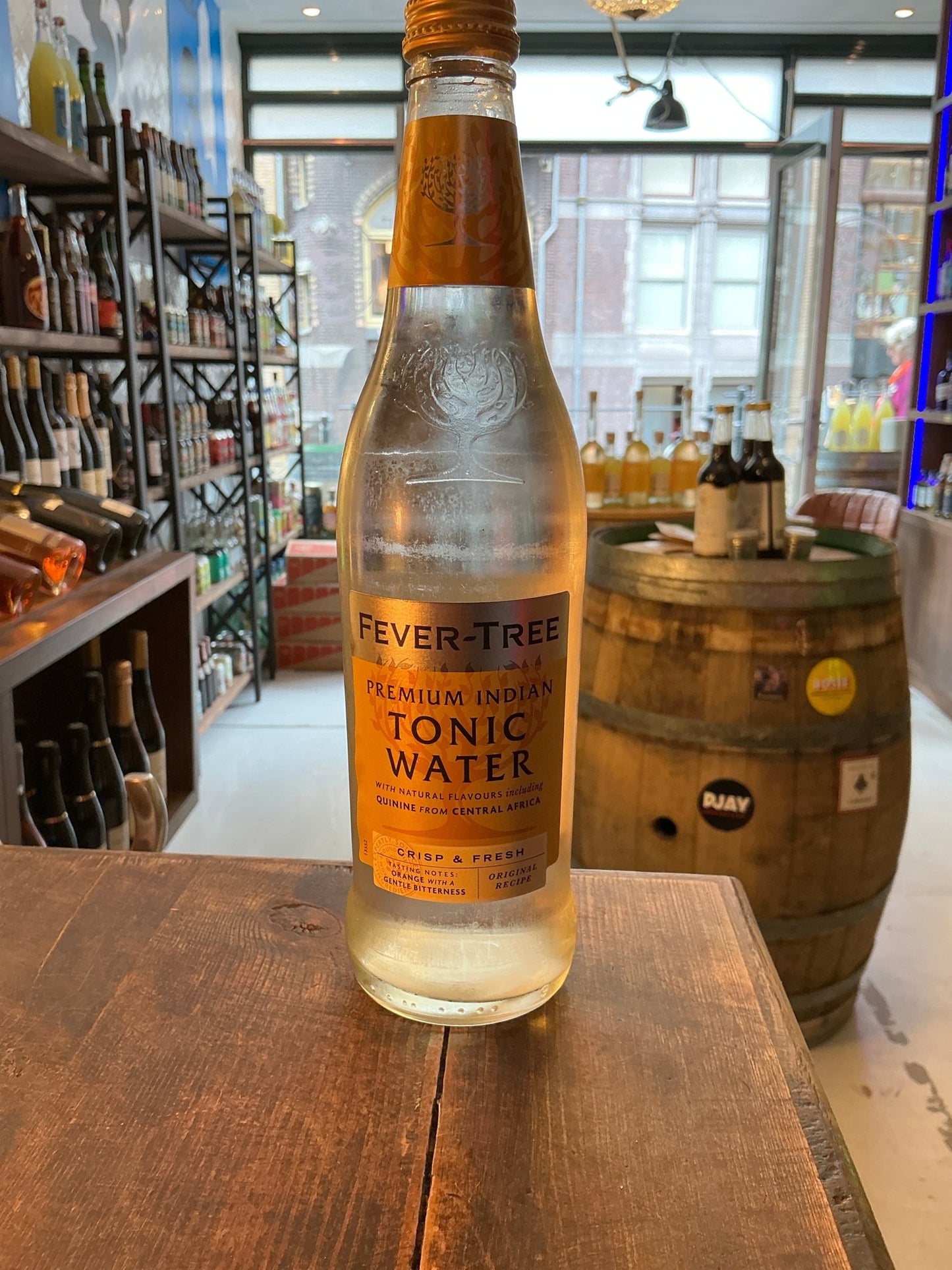 Fever Tree Indian Tonic 50cl clear glass bottle with orange and silver label, premium botanical tonic water perfect with.