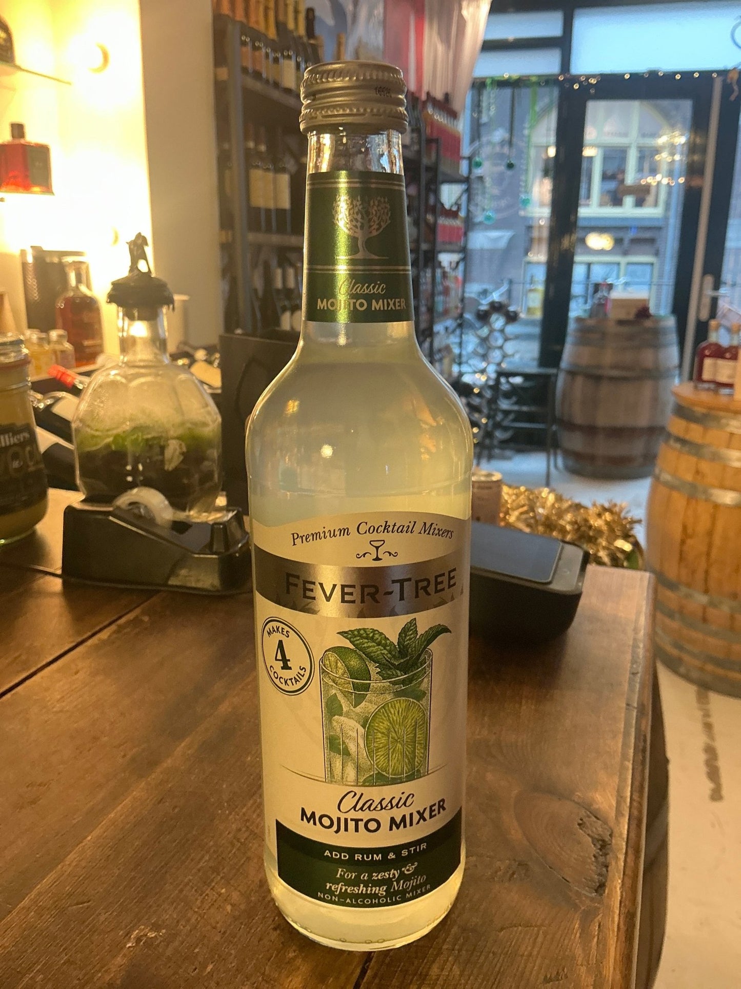 Fever-Tree Mojito Mixer bottle with botanical lime and mint imagery, premium mixer for rum and specialty spirits.