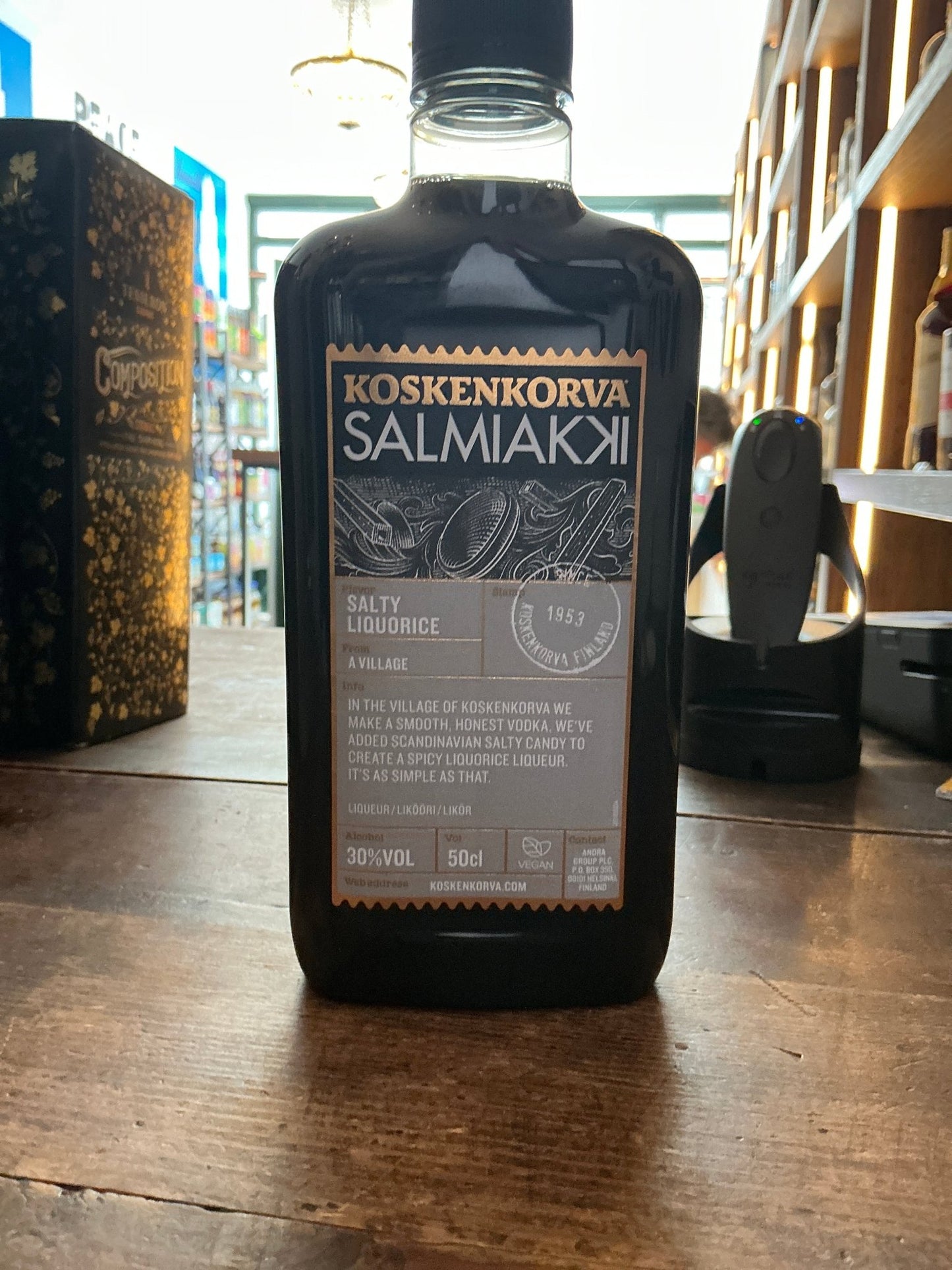 Koskenkorva Salmiakki Finnish salty licorice liqueur bottle with black label and distinctive salmiakki flavor, 30% ABV