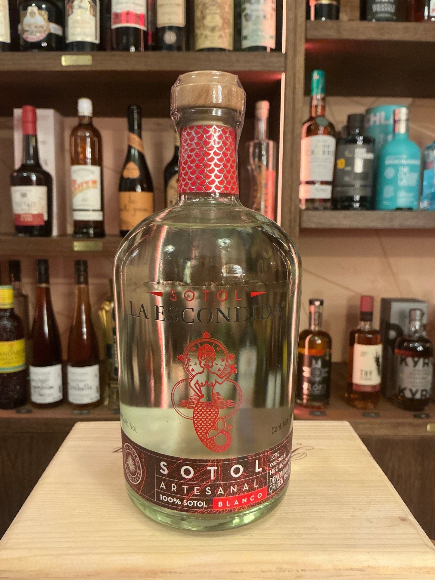 La Escondida Sotol premium artisan distilled spirit bottle with botanical and spiced notes, small batch specialty spirits.