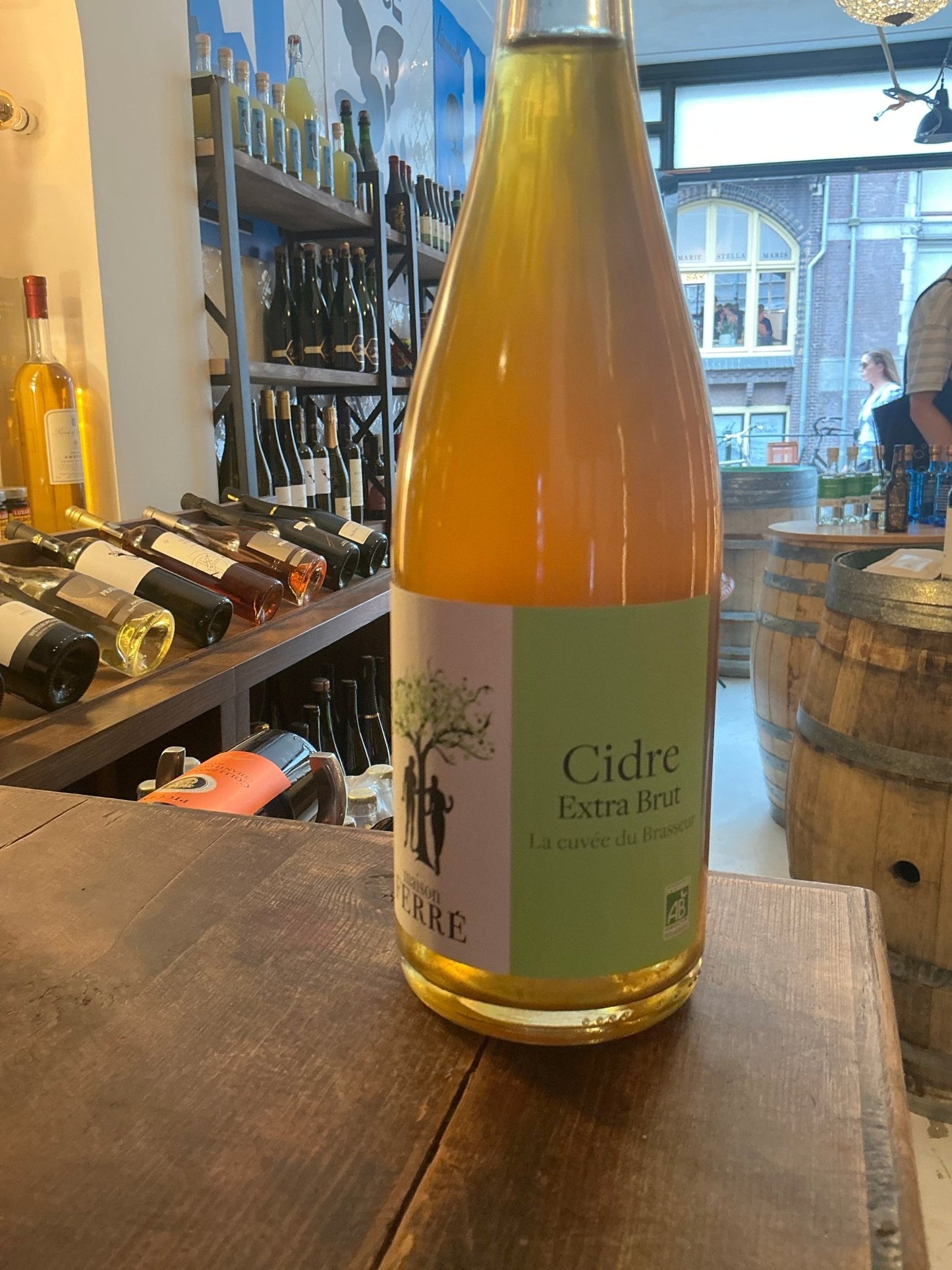 Maison Ferré La Cuvée de Brasseur Normandy cider bottle, premium artisan small-batch craft cider with botanical notes in.