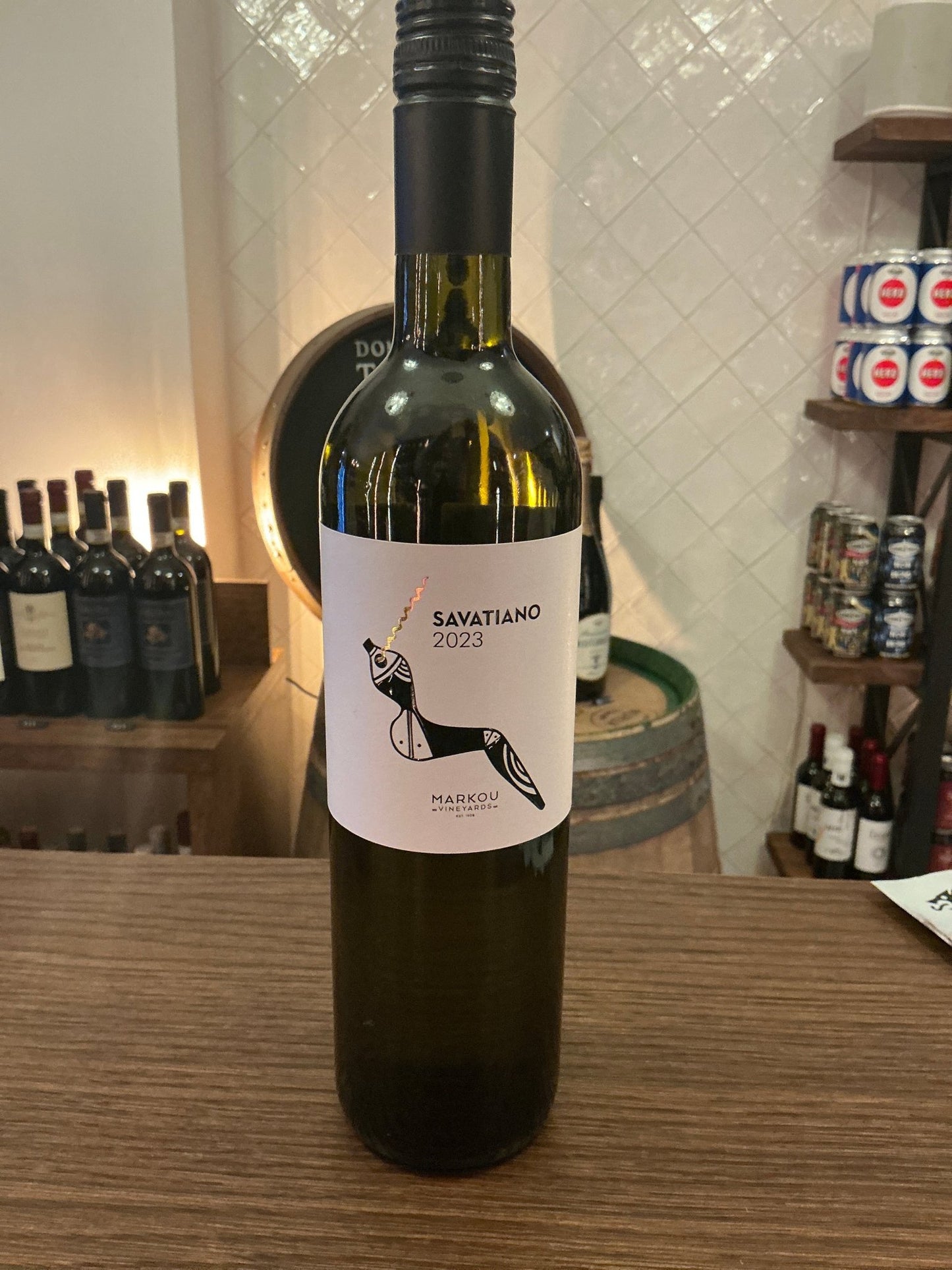 Markou Savatiano 2024 Greek white wine bottle with minimalist label, premium artisan craftsmanship, small batch specialty.