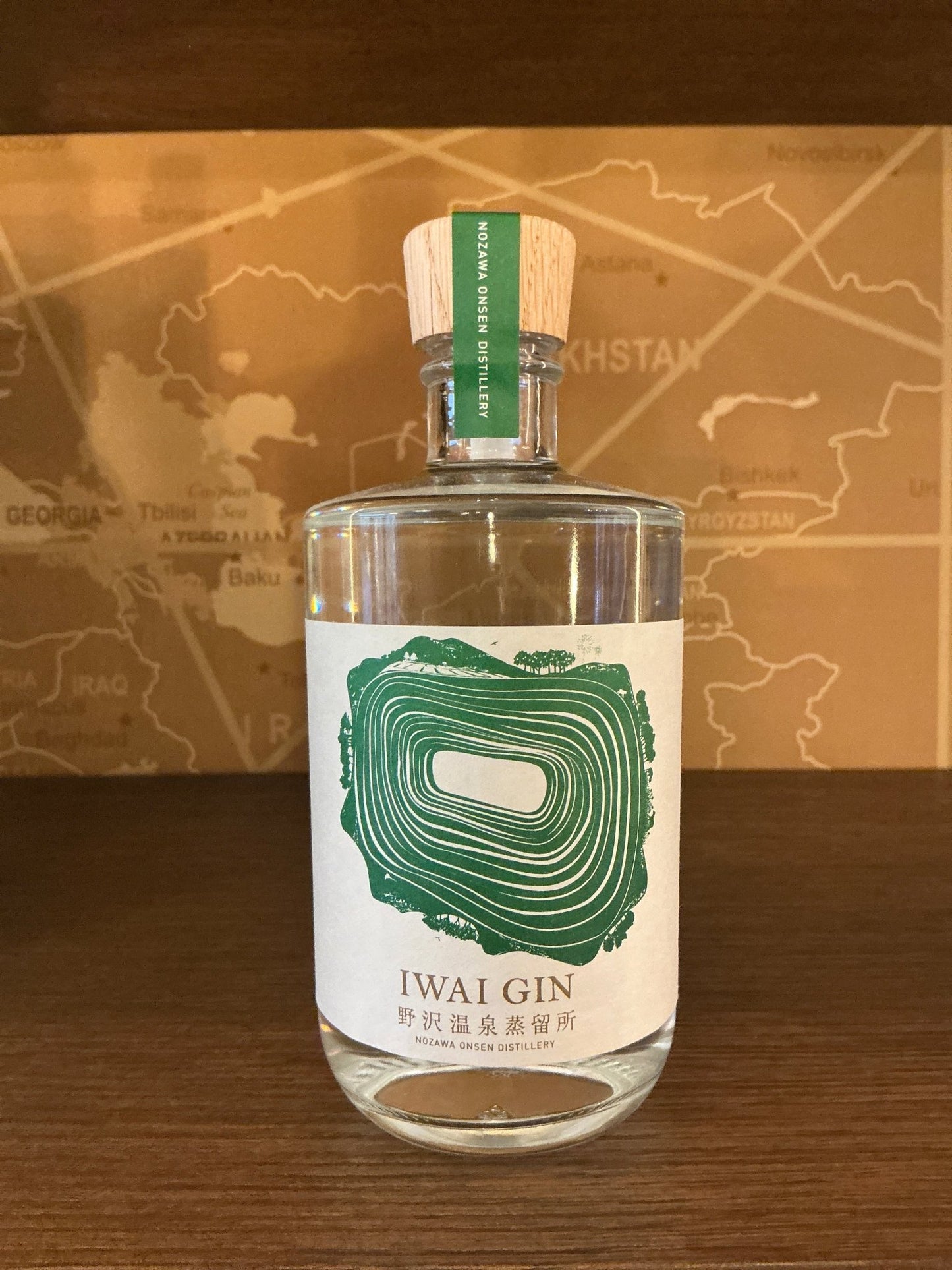 Nozawa Onsen Iwai Sansho Pepper Gin in clear bottle with green top, artisanal Dutch craft, premium limited edition Japanese.