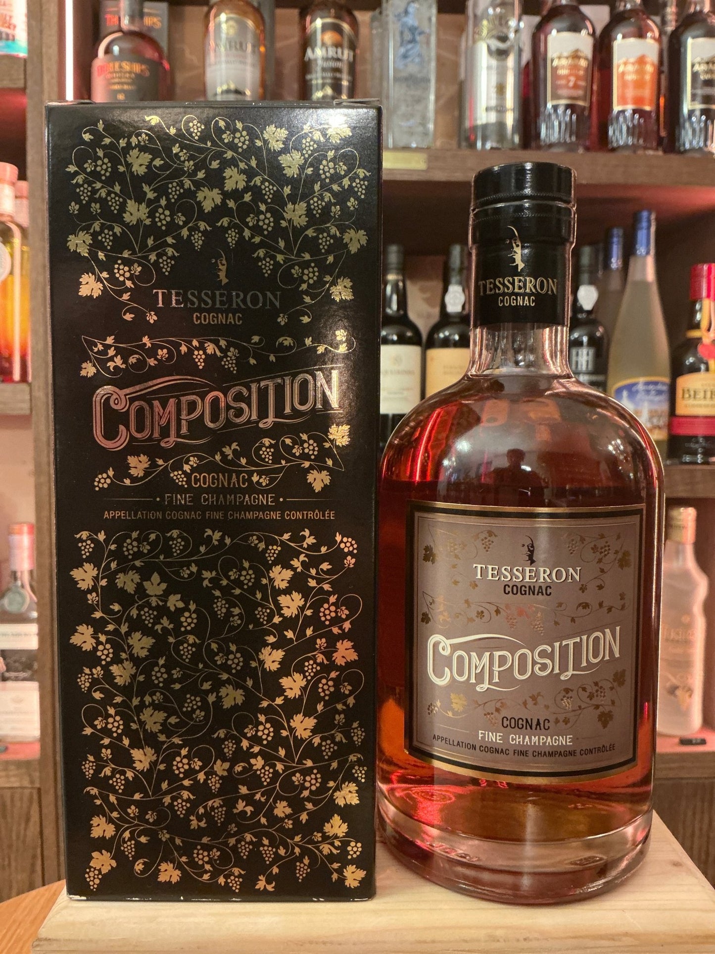 Tesseron Composition French Cognac bottle with matching black and gold floral box, premium aged brandy, artisan small batch.