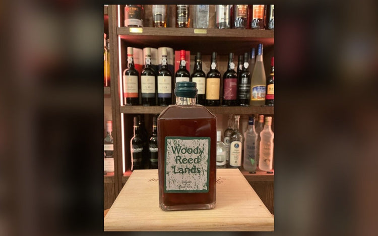 Bottle of Woody Reed Lands non-alcoholic rum alternative at Daan's Drinks