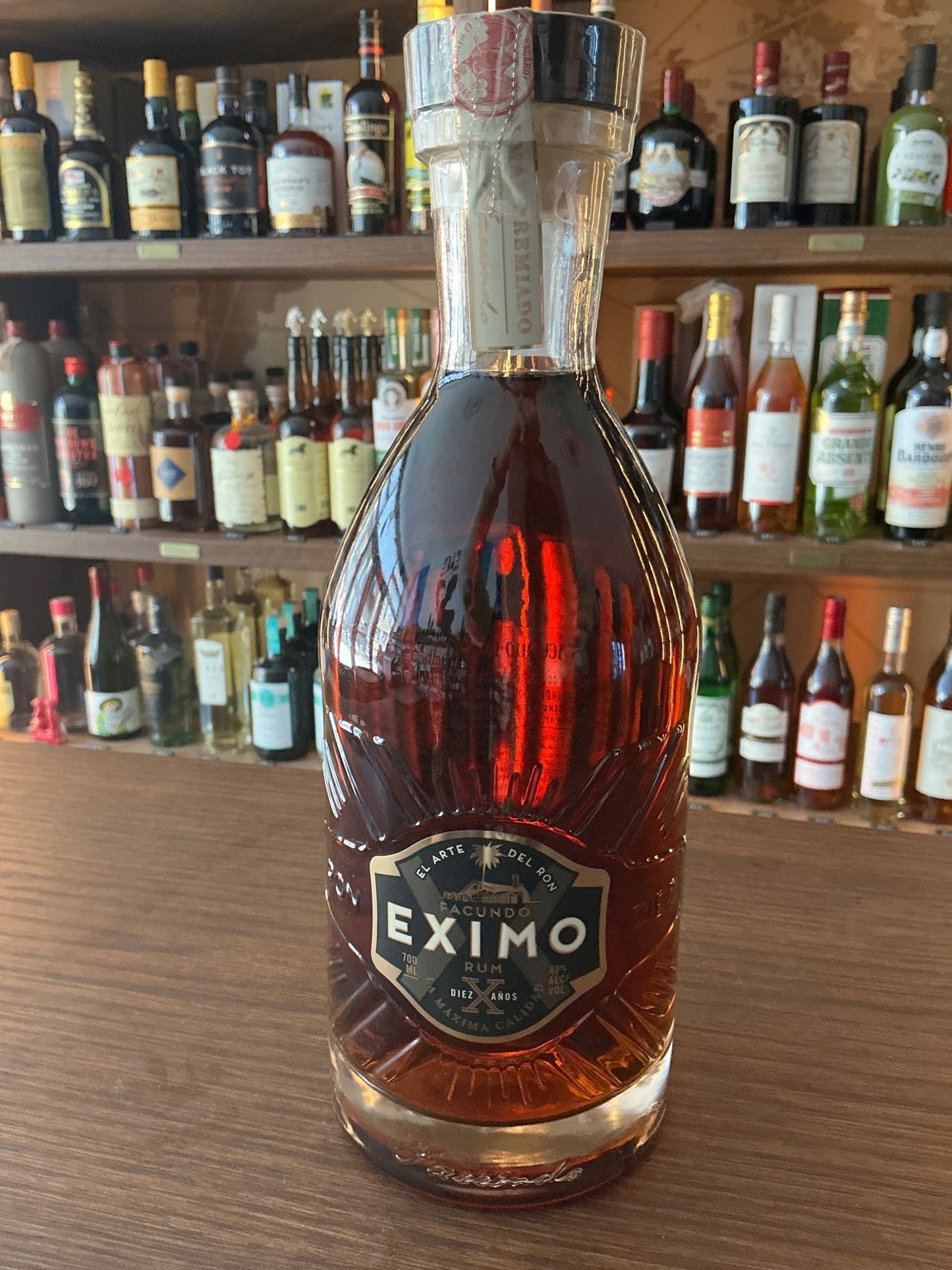 Premium Bacardi Facundo Eximo 10 Year aged rum in clear glass bottle with black and gold label.