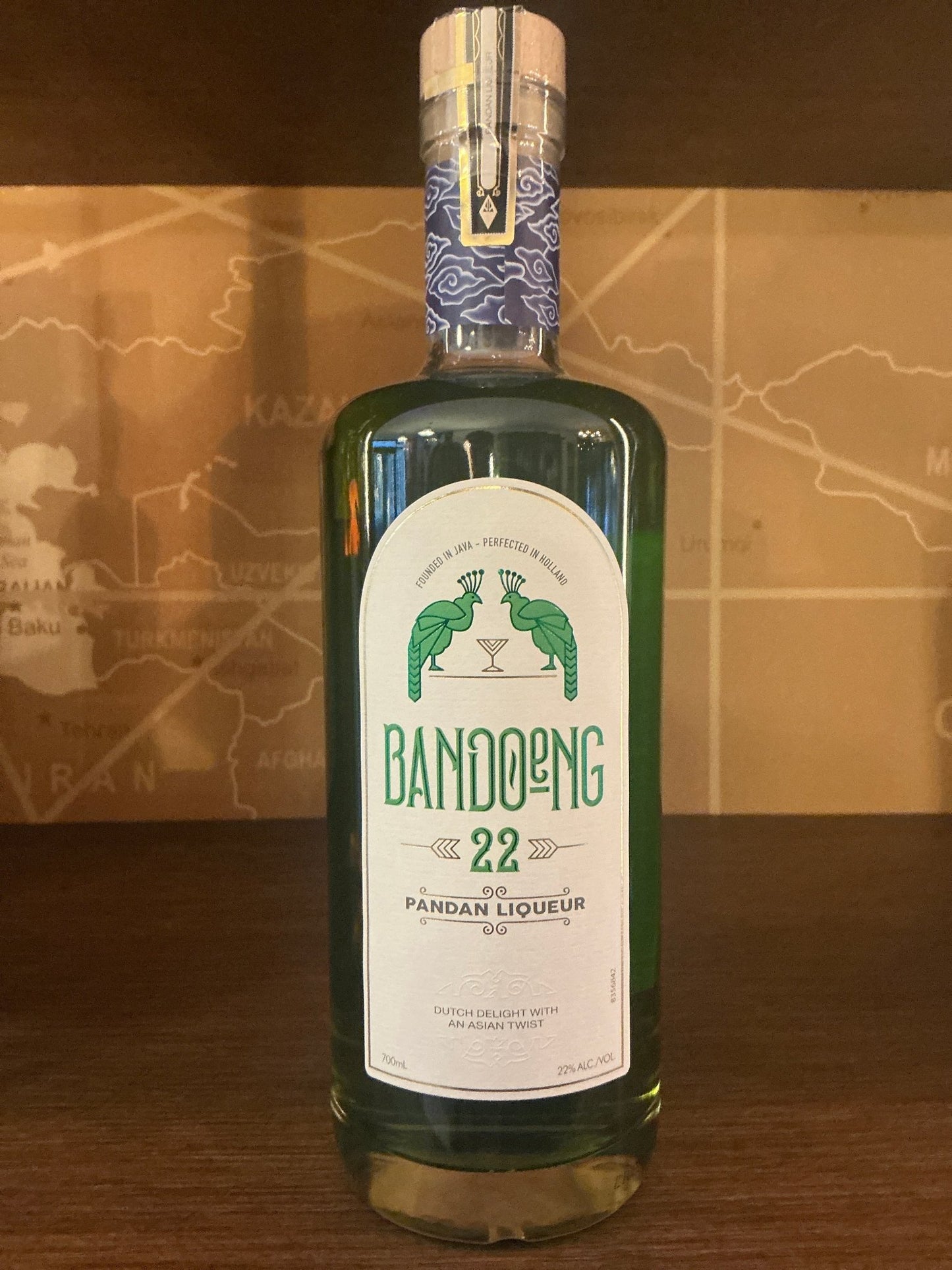 Bandoeng '22 Pandan Liqueur 700ml bottle with green herbal spirit, premium craft Dutch artisanal design, limited edition.