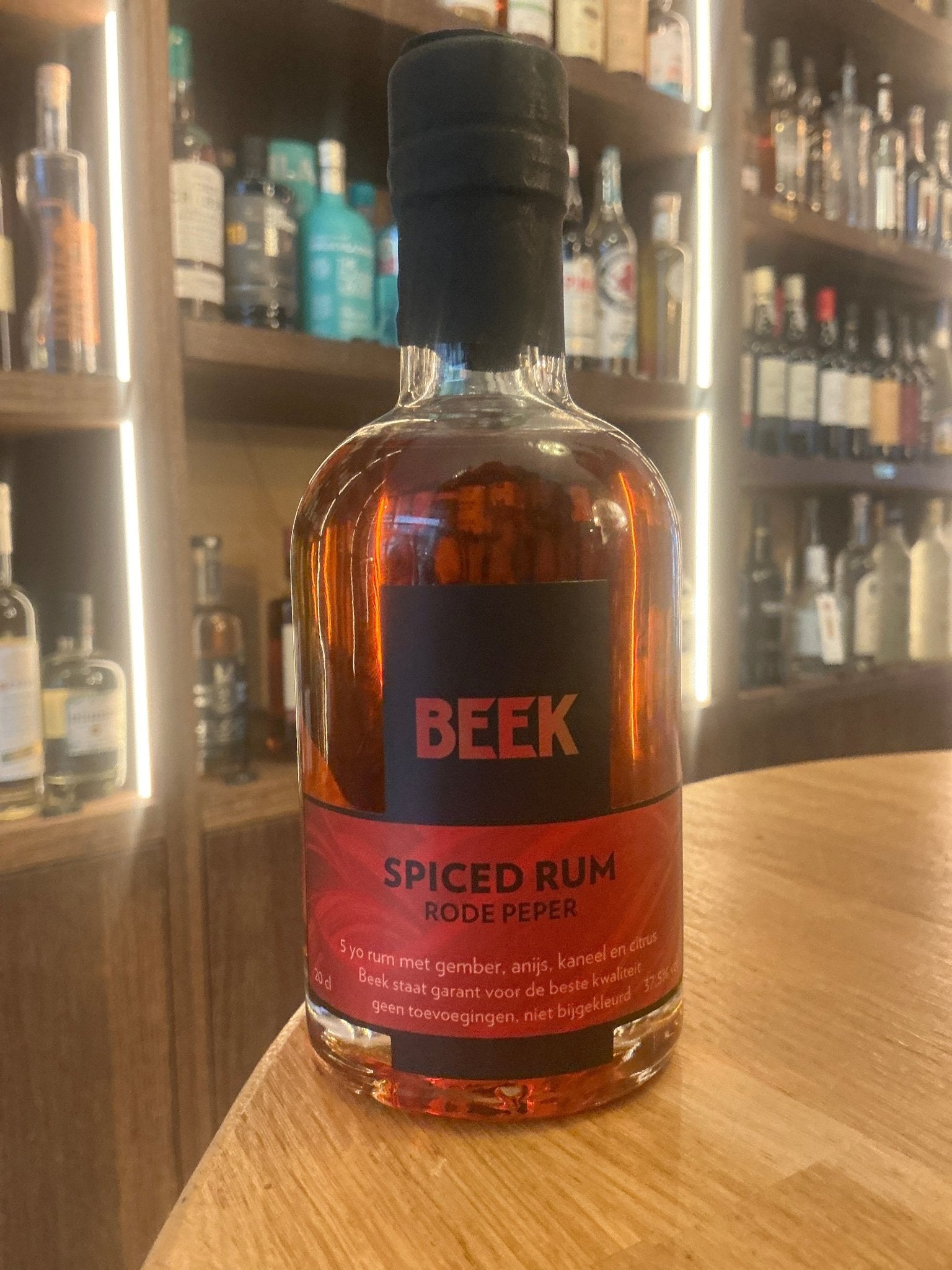Beek Spiced Rum 20cl small batch artisan Dutch bottle with rich amber color and premium botanical spices.