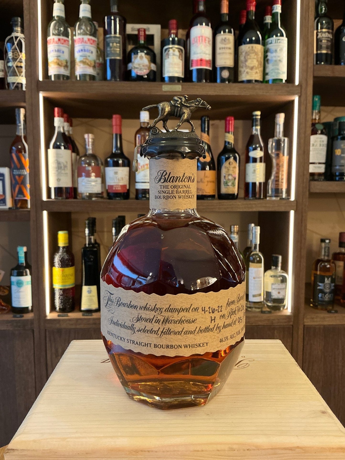 Blanton's Bourbon small batch artisan bottle with embossed stopper, aged amber whiskey, premium specialty spirits label.