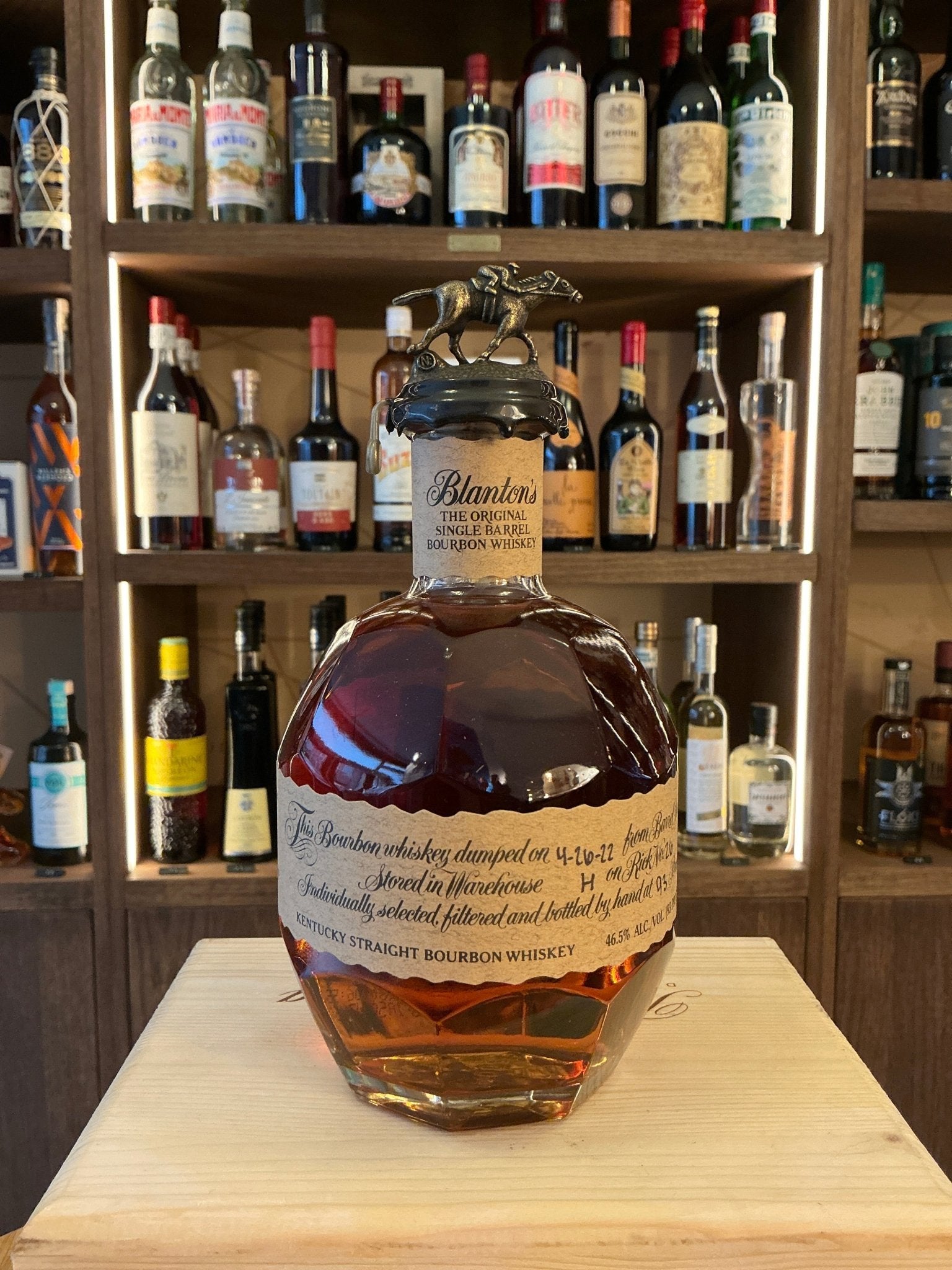 Blanton's Bourbon small batch artisan bottle with embossed stopper, aged amber whiskey, premium specialty spirits label.