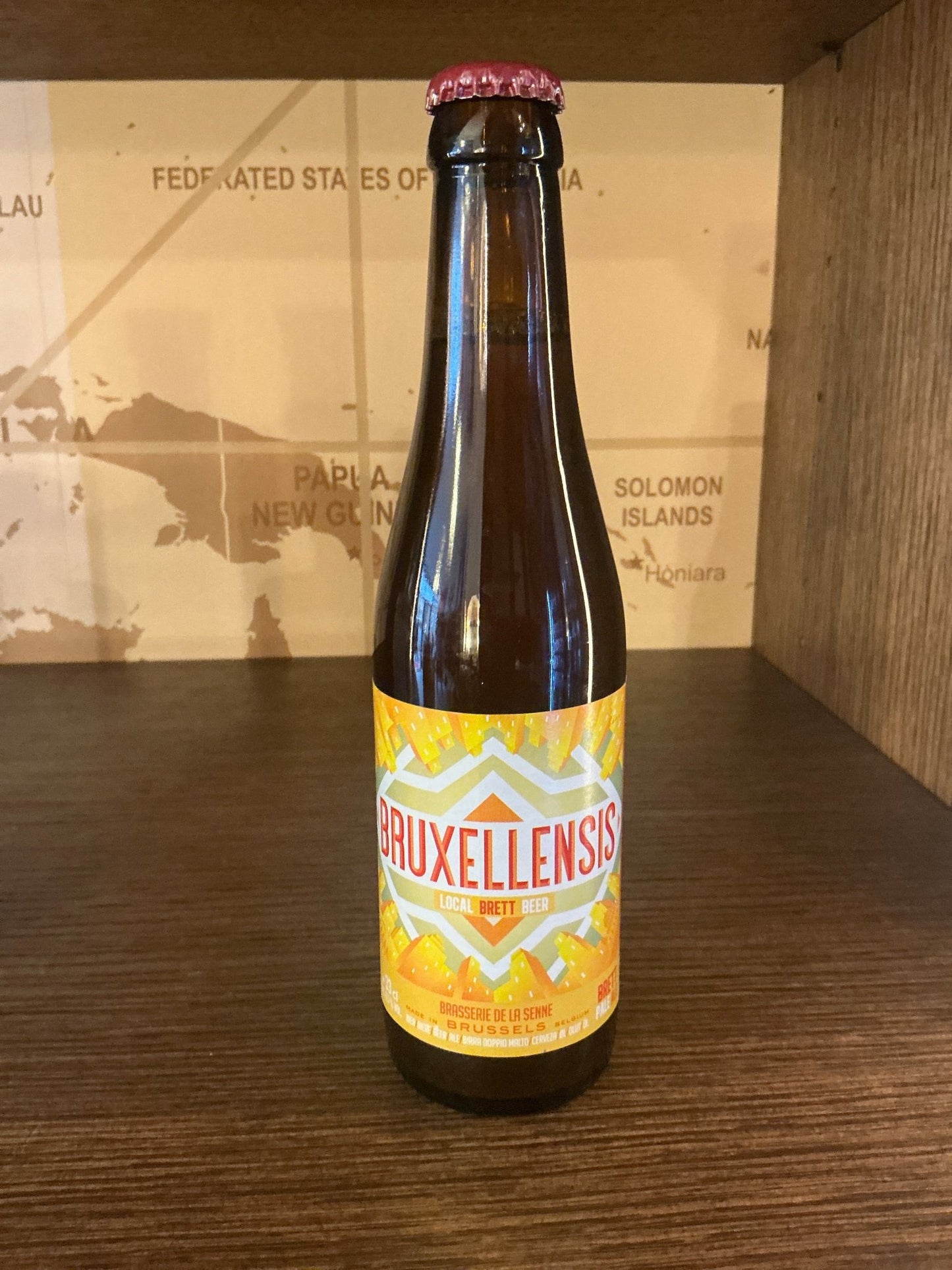 Brasserie de la Senne Bruxellensis craft beer bottle with bright yellow label, artisanal Dutch limited edition Brett wild ale.