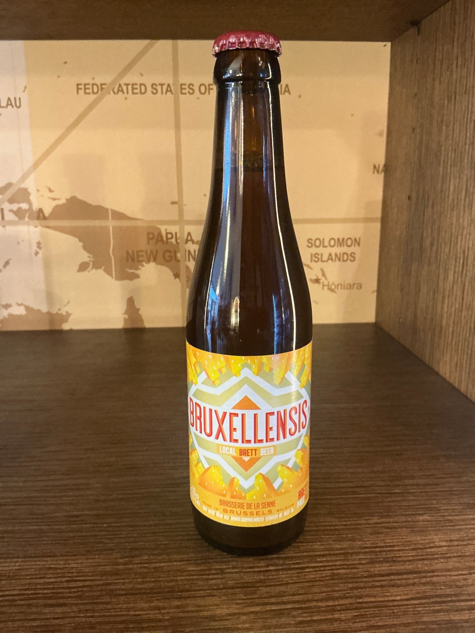 Brasserie de la Senne Bruxellensis craft beer bottle with bright yellow label, artisanal Dutch limited edition Brett wild ale.