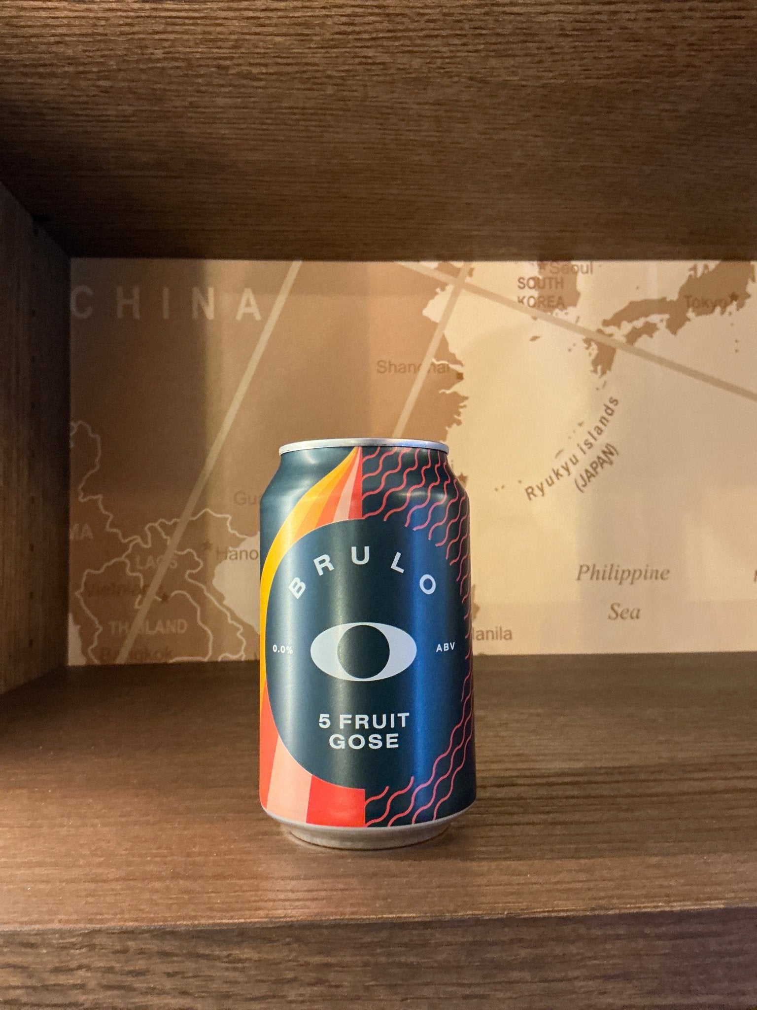 Brulo 5 Fruit Gose craft beer can with colorful blue, red, and orange design, premium artisan small batch non-alcoholic sour .