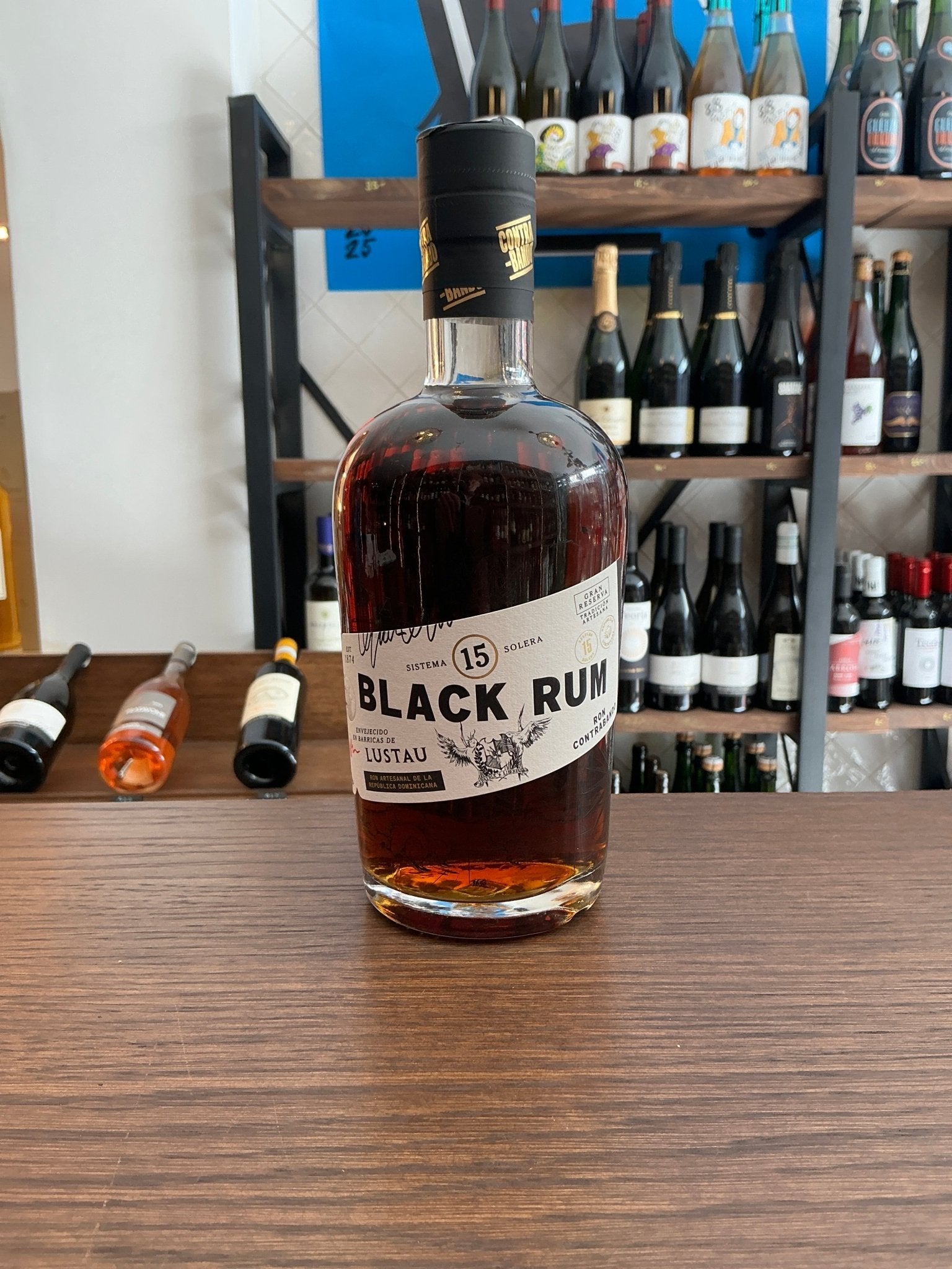 Contra Bando Black Rum Solera 15 Lustau Cask premium aged dark rum bottle with black and white label, small batch artisan.