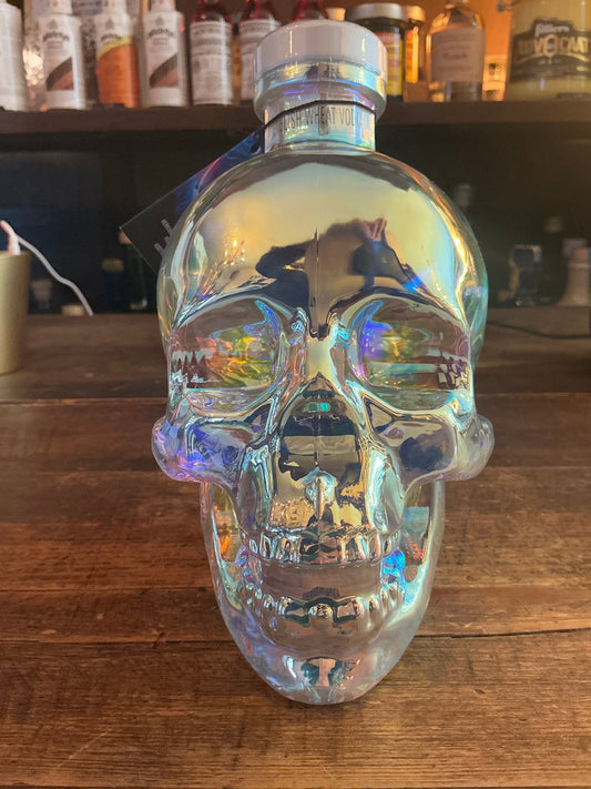 Crystal Head Aurora Vodka premium clear vodka in iridescent skull-shaped bottle, artisan distilled specialty spirit.