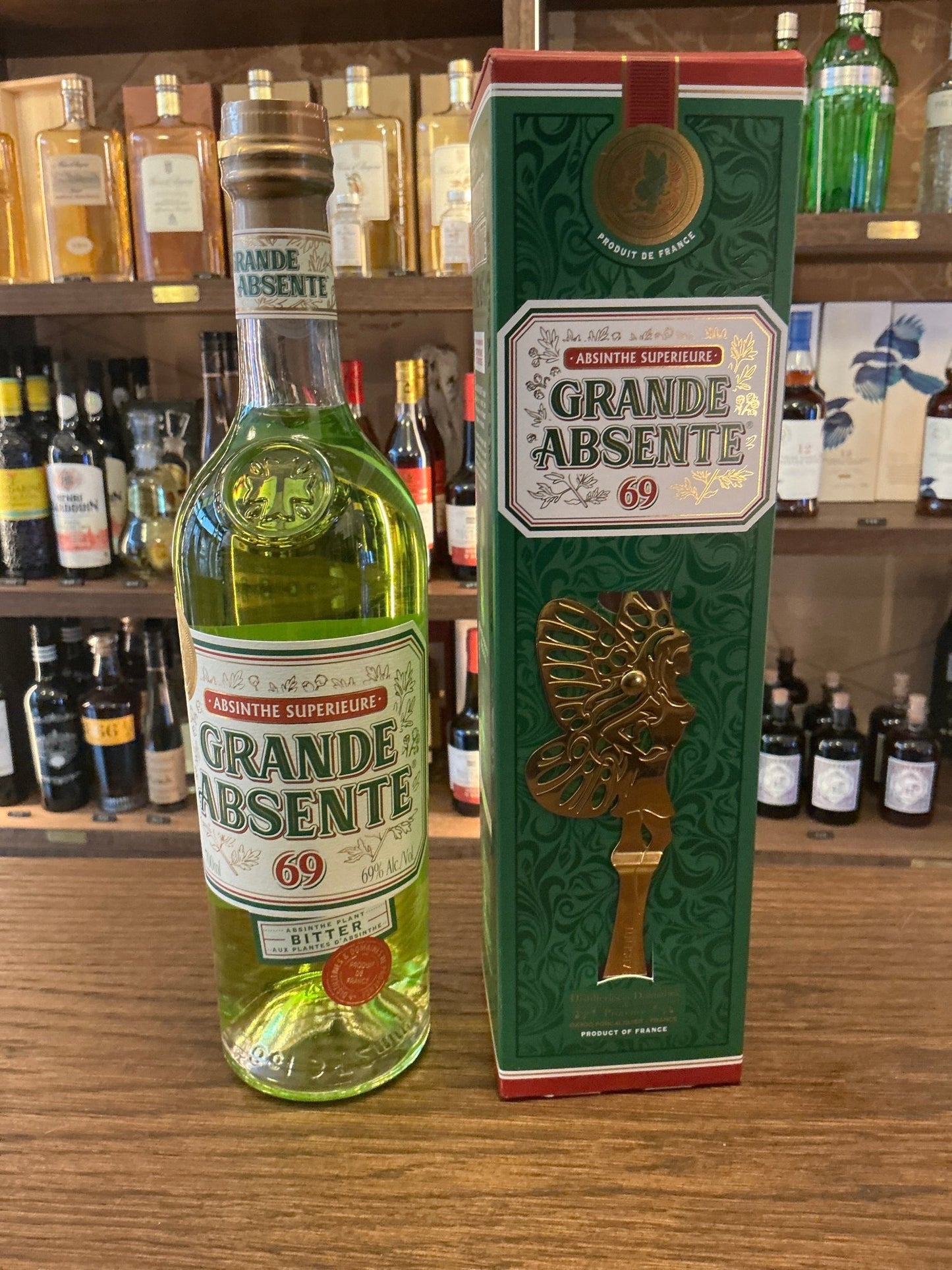 D.D. Grande Absente bottled green absinthe with 69% ABV, artisan Dutch botanical liqueur in embossed green and gold.