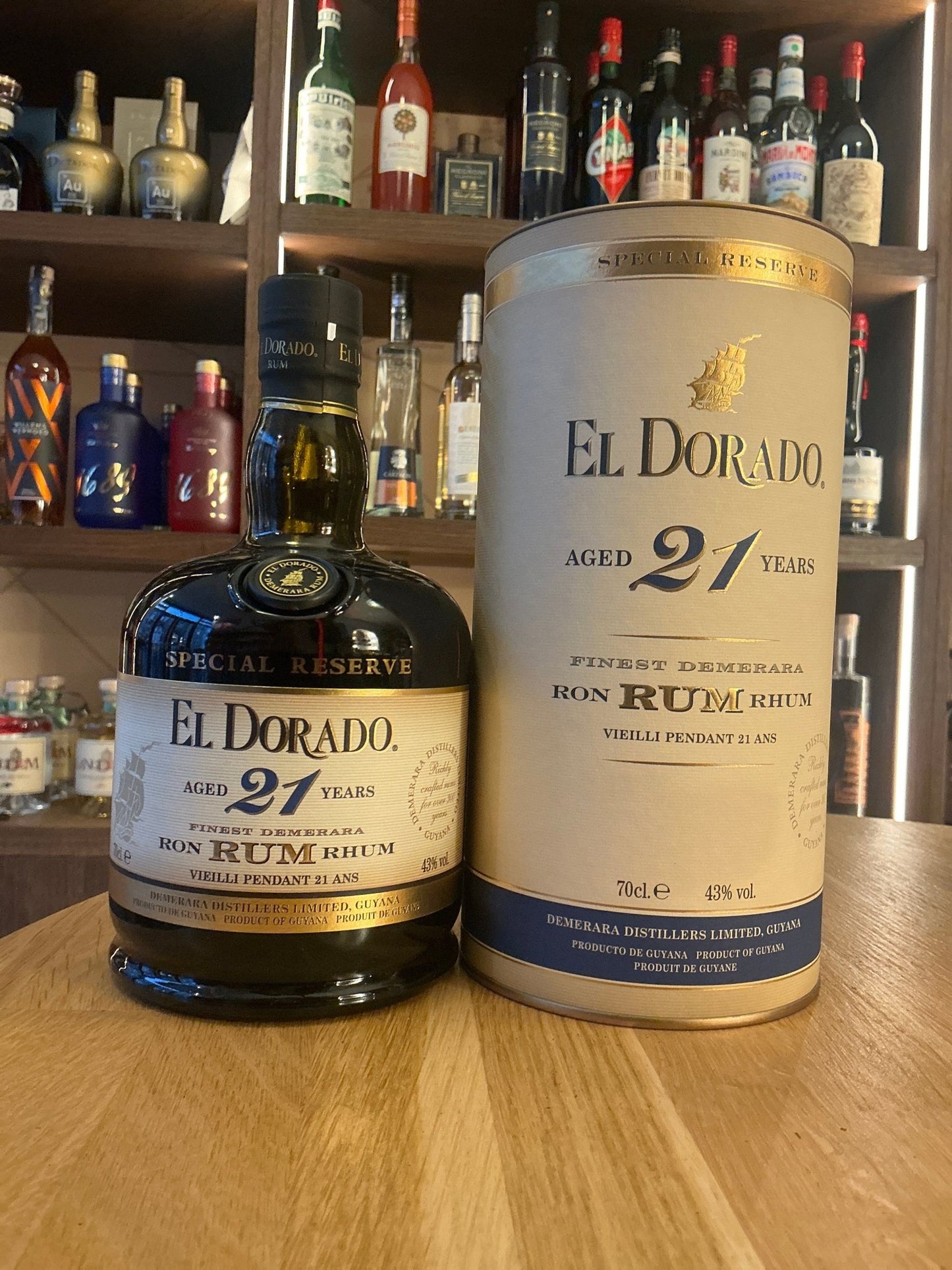El Dorado 21 Year Aged Rum bottle and cylindrical box, premium small batch distilled artisan rum with rich aged flavor.