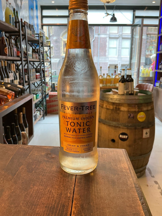 Fever Tree Indian Tonic 50cl clear glass bottle with orange and silver label, premium botanical tonic water perfect with.