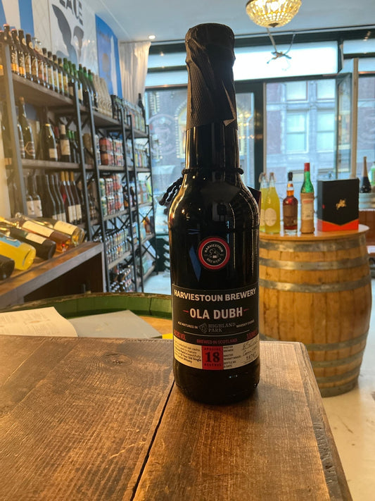 Harviestoun Brewery Ola Dubh 18 Year Special Reserve dark craft beer bottle with premium aged porter label on wooden table.