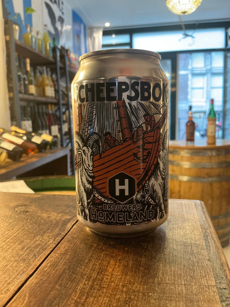 Homeland Scheepsbok craft beer can with Dutch artisan branding, featuring detailed nautical and botanical illustrations in.