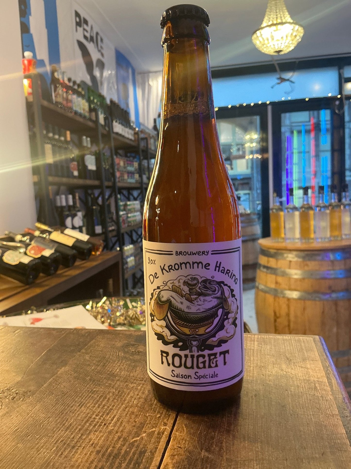 Kromme Haring Rouget Saison Spéciale 33cl brown glass bottle with artisanal label featuring spiced botanical craft beer,.