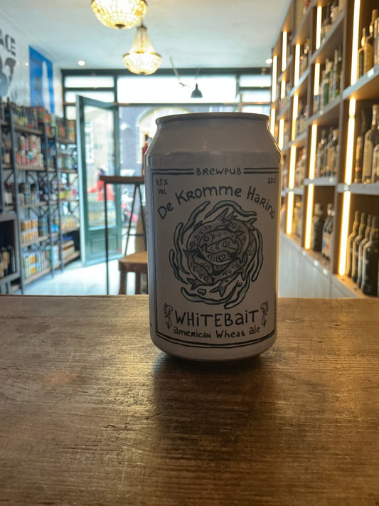 Silver can of Kromme Haring Whitebait American wheat ale with detailed black botanical illustration on label, small batch.