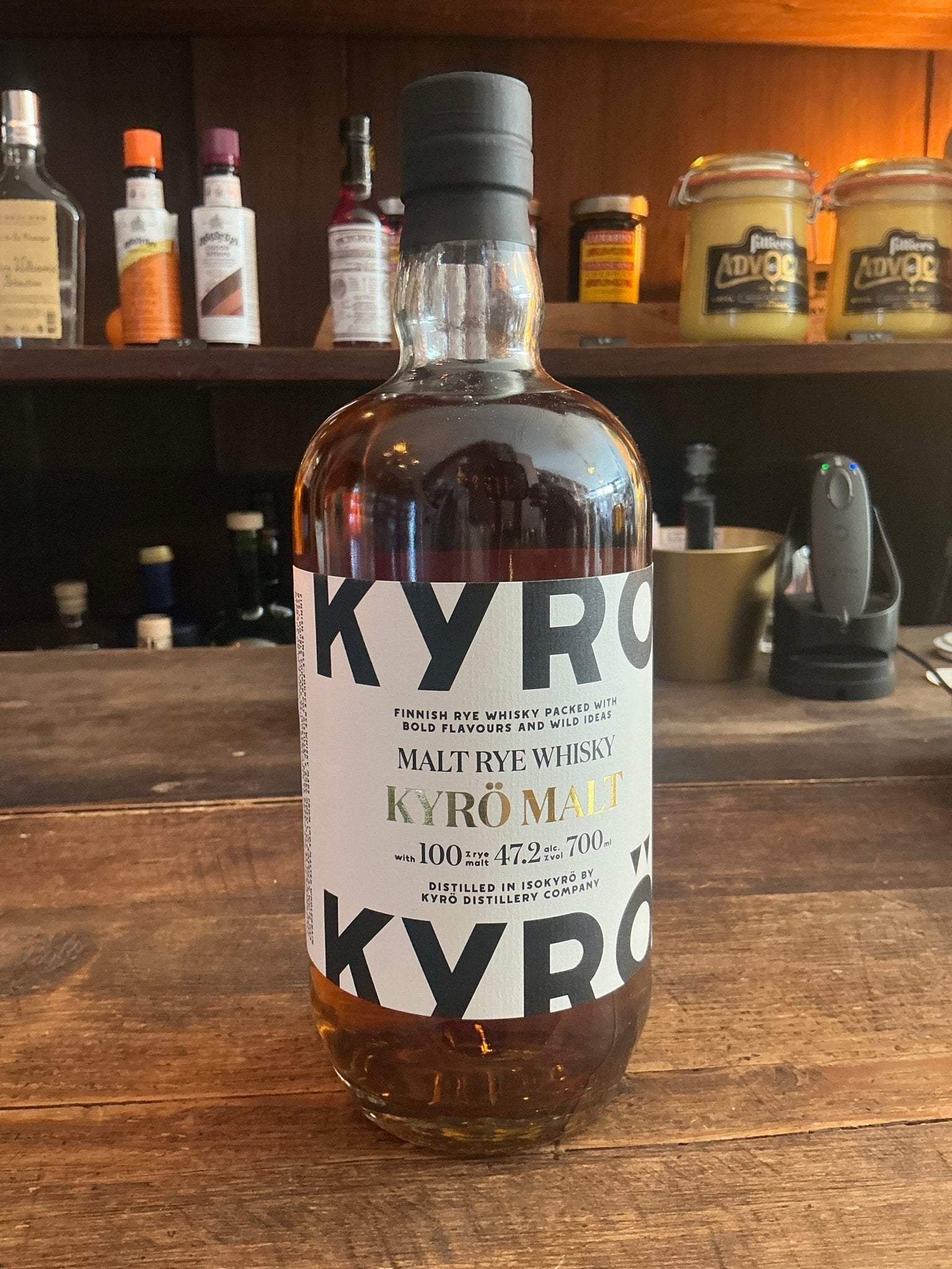 Kyro Malt Rye Whisky bottle with clear label, black cap, amber liquid, artisan small batch Finnish whisky.
