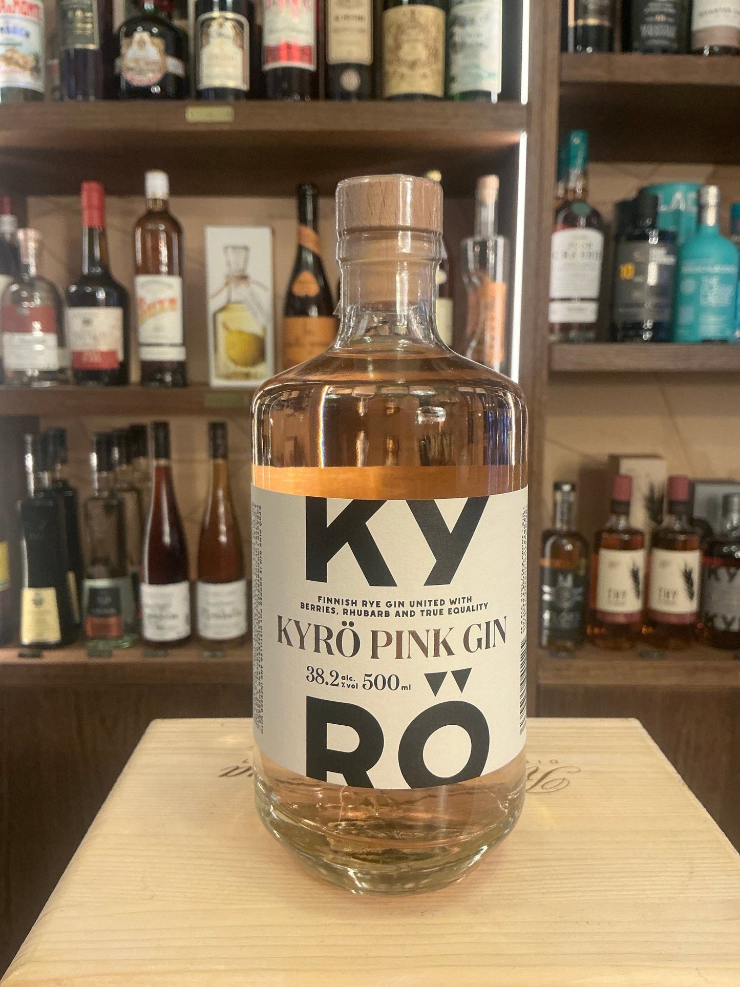 Kyro Pink Gin small batch bottle with clear glass, minimalist label, and natural cork stopper, displaying artisan Dutch.