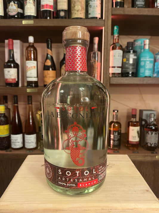 La Escondida Sotol premium artisan distilled spirit bottle with botanical and spiced notes, small batch specialty spirits.