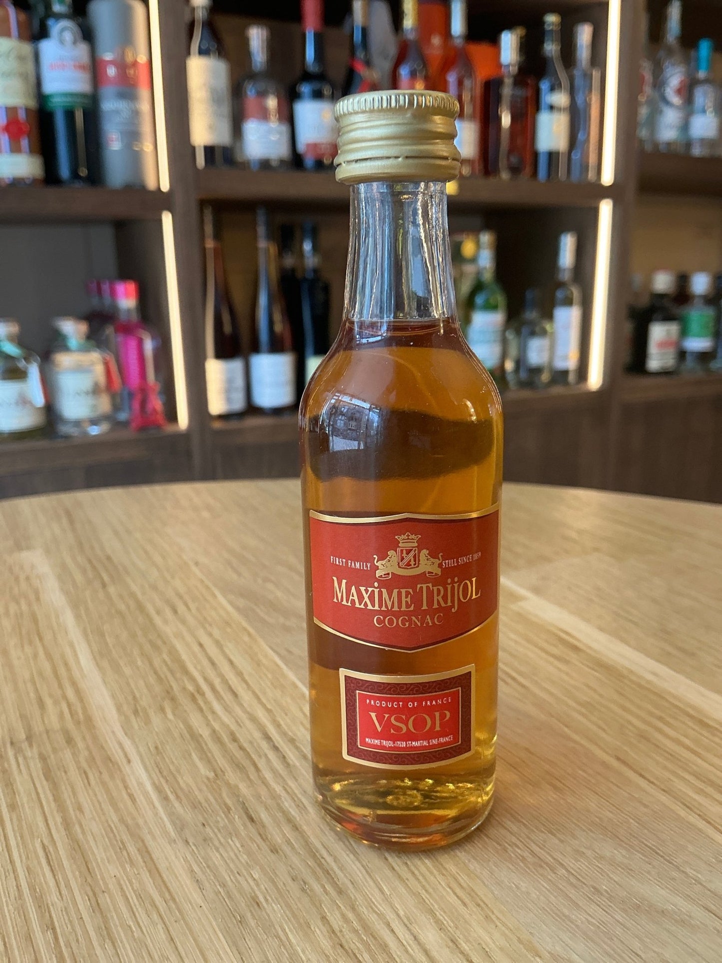 Maxime Trijol VSOP miniature bottle of premium aged Cognac with deep amber color, artisanal French brandy from Grand.