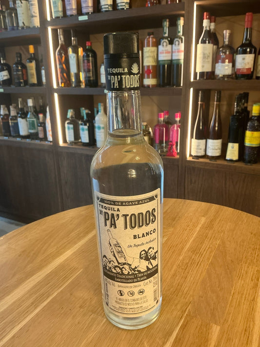 Pa’ Todos Blanco premium small batch tequila bottle with artisan label, clear liquid, distilled in a botanical, spiced.
