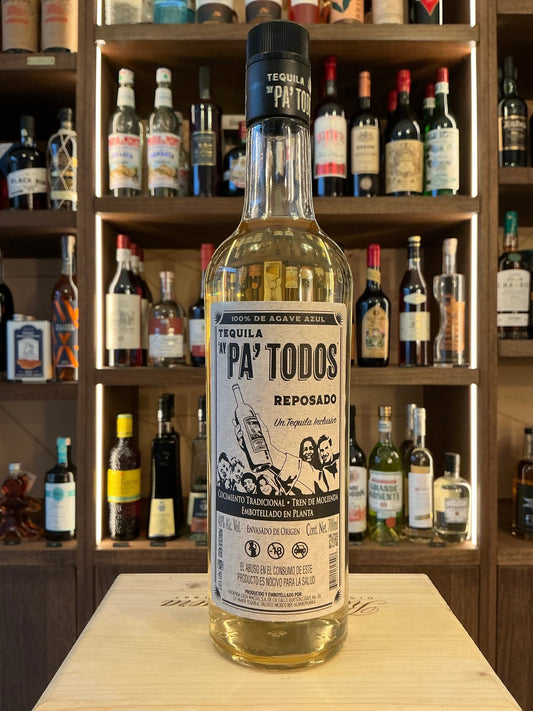 Pa’Todos Reposado premium tequila bottle with aged, distilled artisan spirit in clear glass and detailed black-and-white.