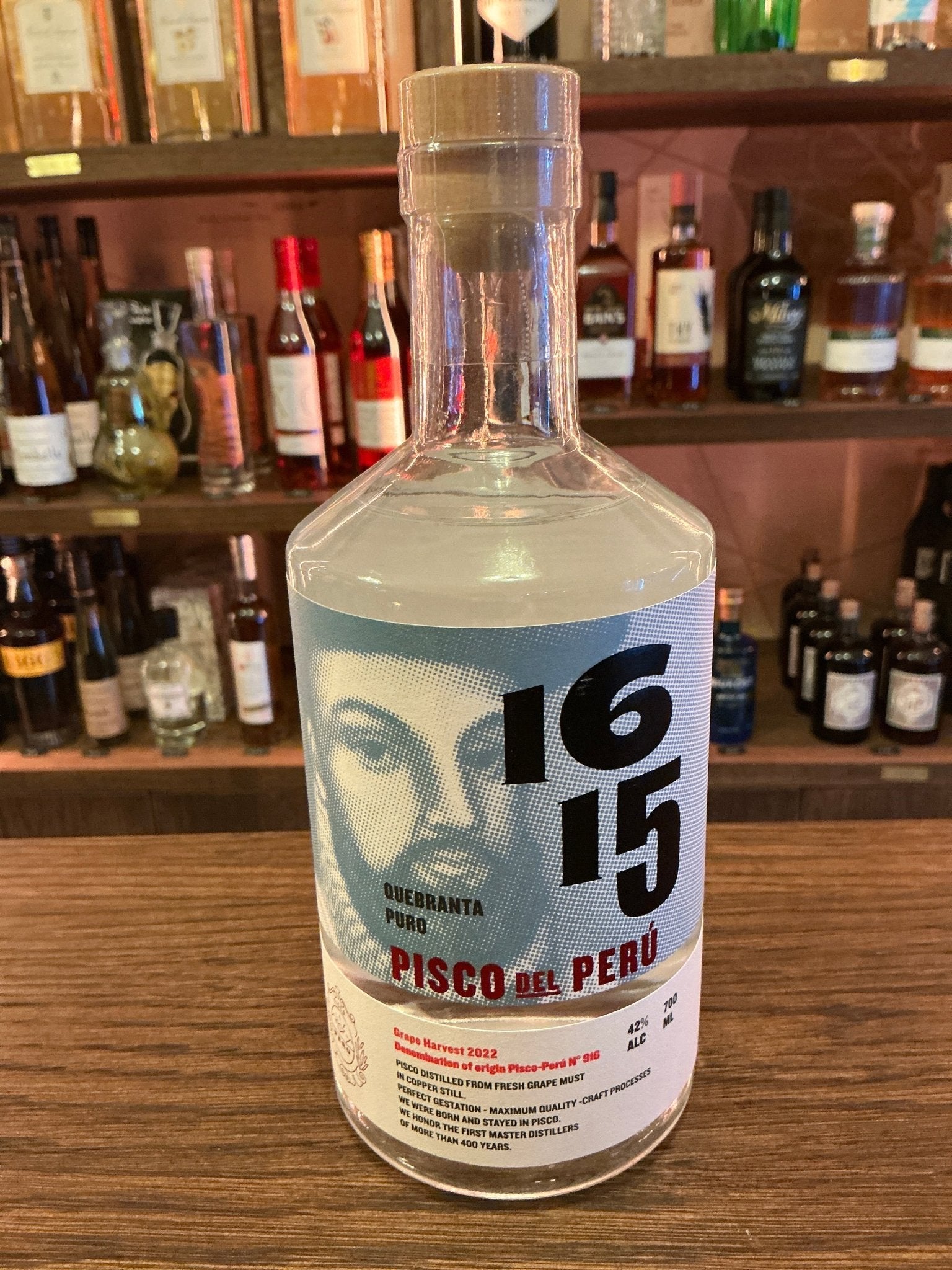 Pisco 1615 Puro Quebranta bottle — unaged single-variety Peruvian pisco from Quebranta grapes, distilled by Bodega San Nicolás