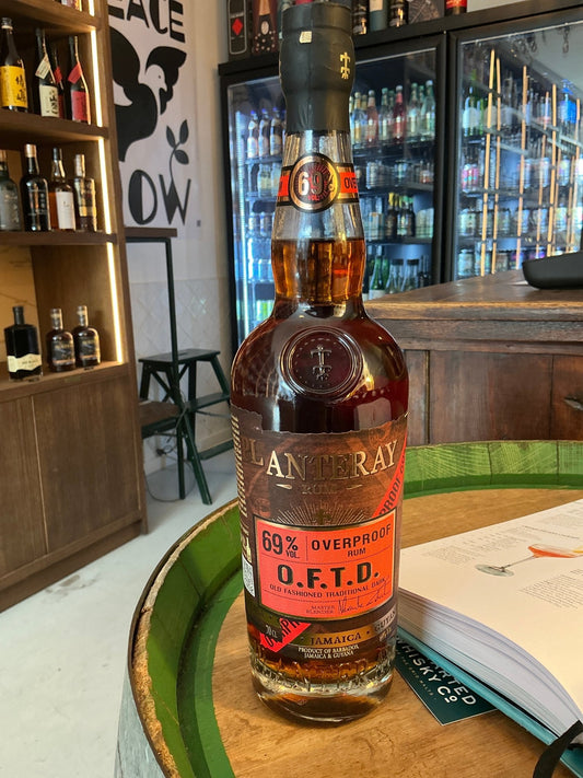 Plantation Overproof O.F.T.D. dark rum bottle with orange label, premium artisan small batch Caribbean spirit.