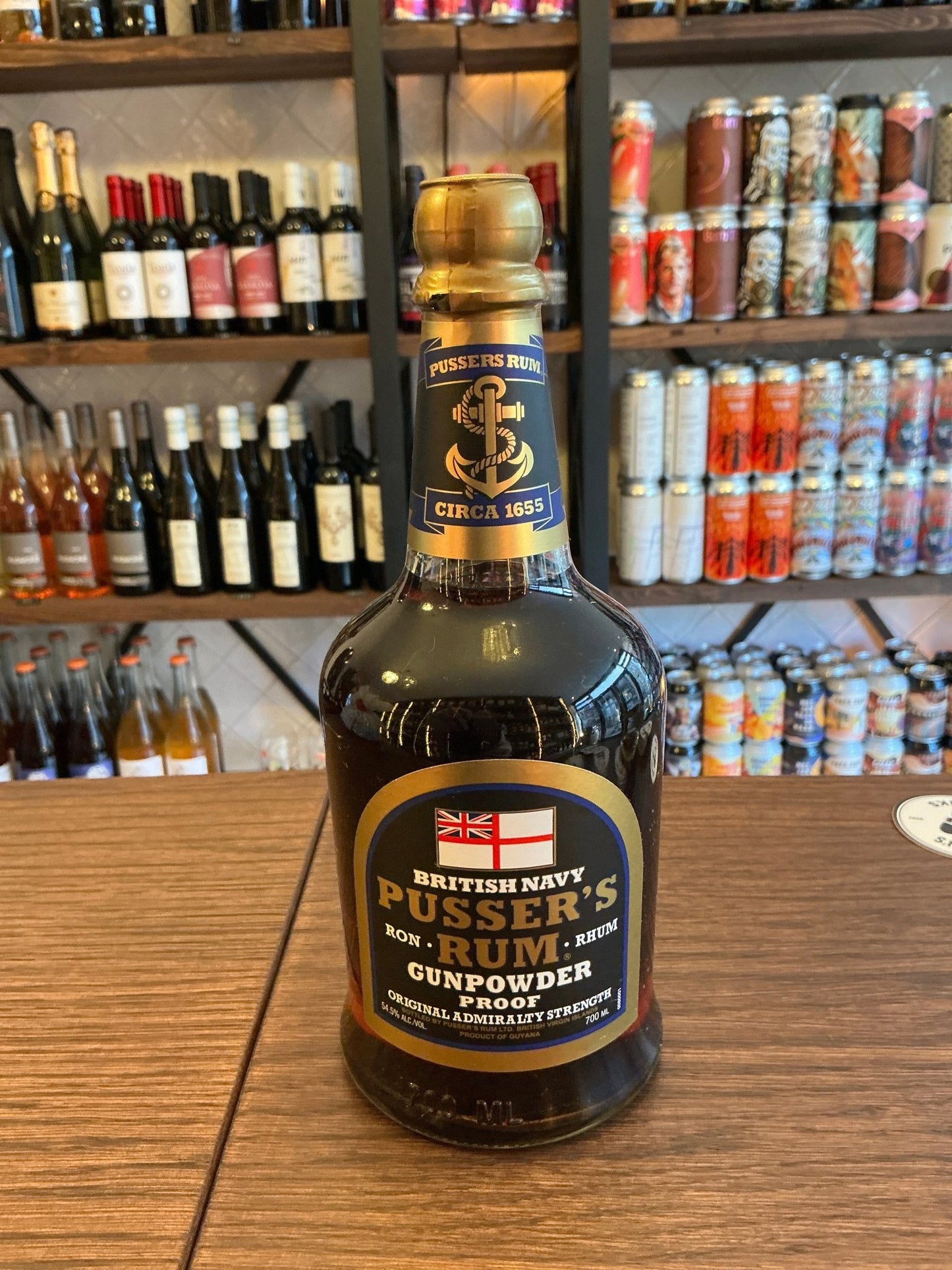 Pusser's Rum Gunpowder Proof bottle with black and gold label, artisan British navy rum, small batch, premium spiced rum,.