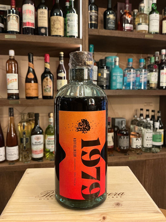 Ravenveld Koffie Likeur bottle with bold orange label, premium Dutch coffee liqueur, artisan small batch spirit.