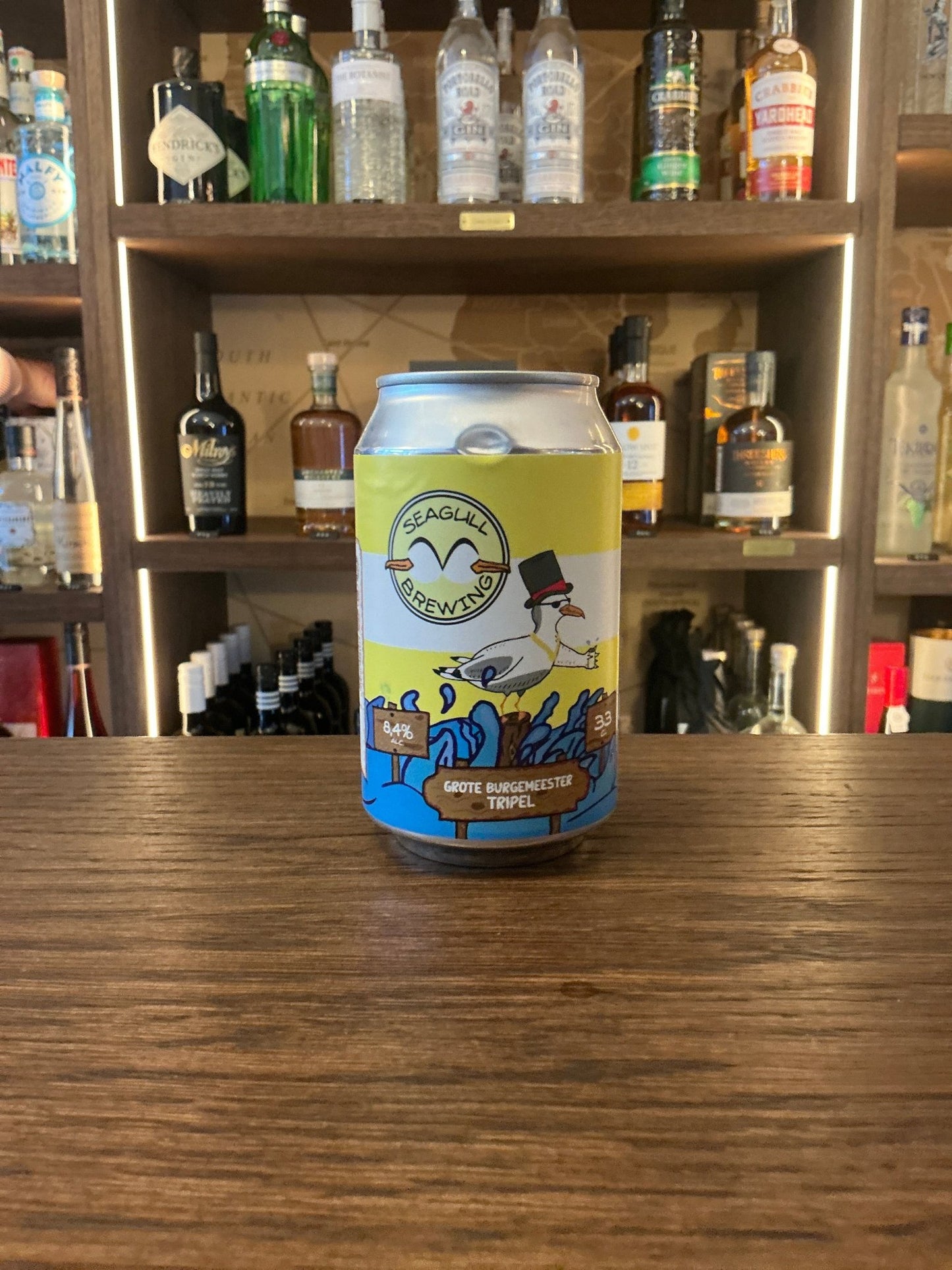 Seagull Brewing Grote Burgemeester Tripel Belgian ale craft beer can with blue and yellow label featuring seagull and ship.