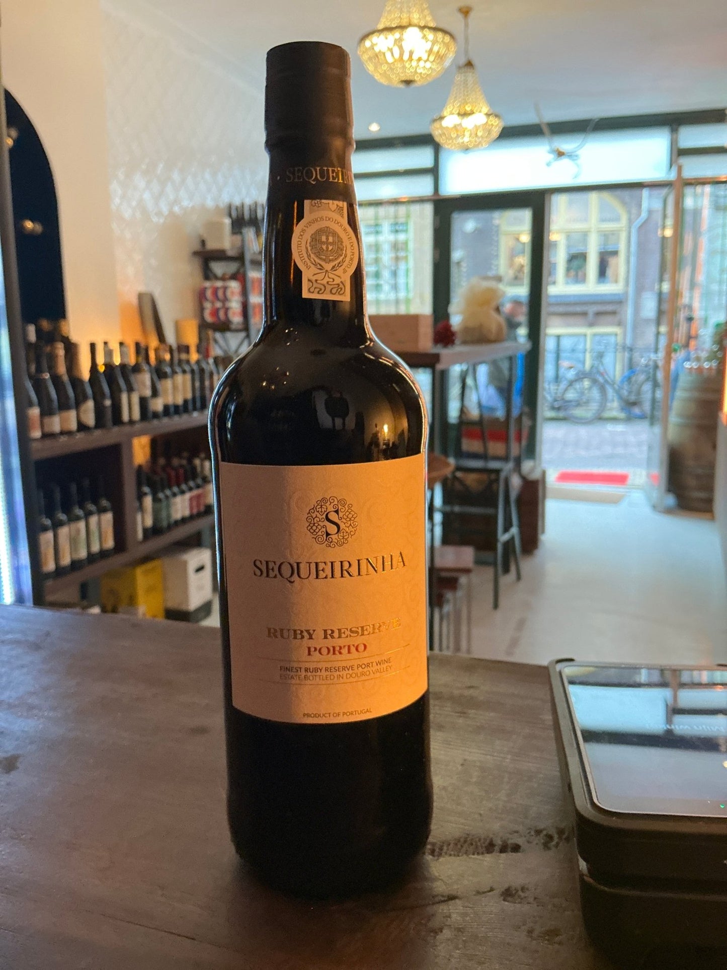 Sequeirinha Ruby Reserve Port in dark green premium bottle with beige label, artisan small batch fortified wine, rich ruby.