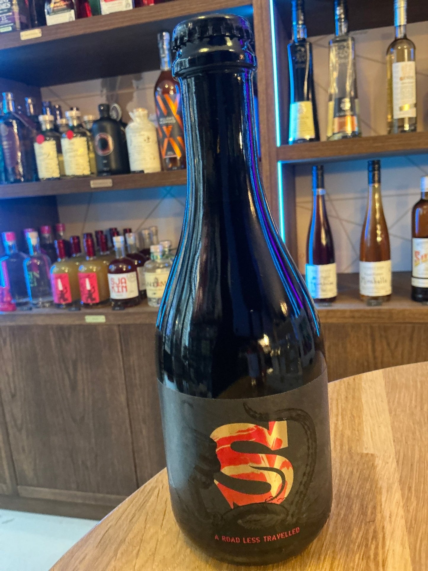 Siren 375ml bottle of premium craft Scotch Ale with artisanal Dutch limited edition label in black glass.