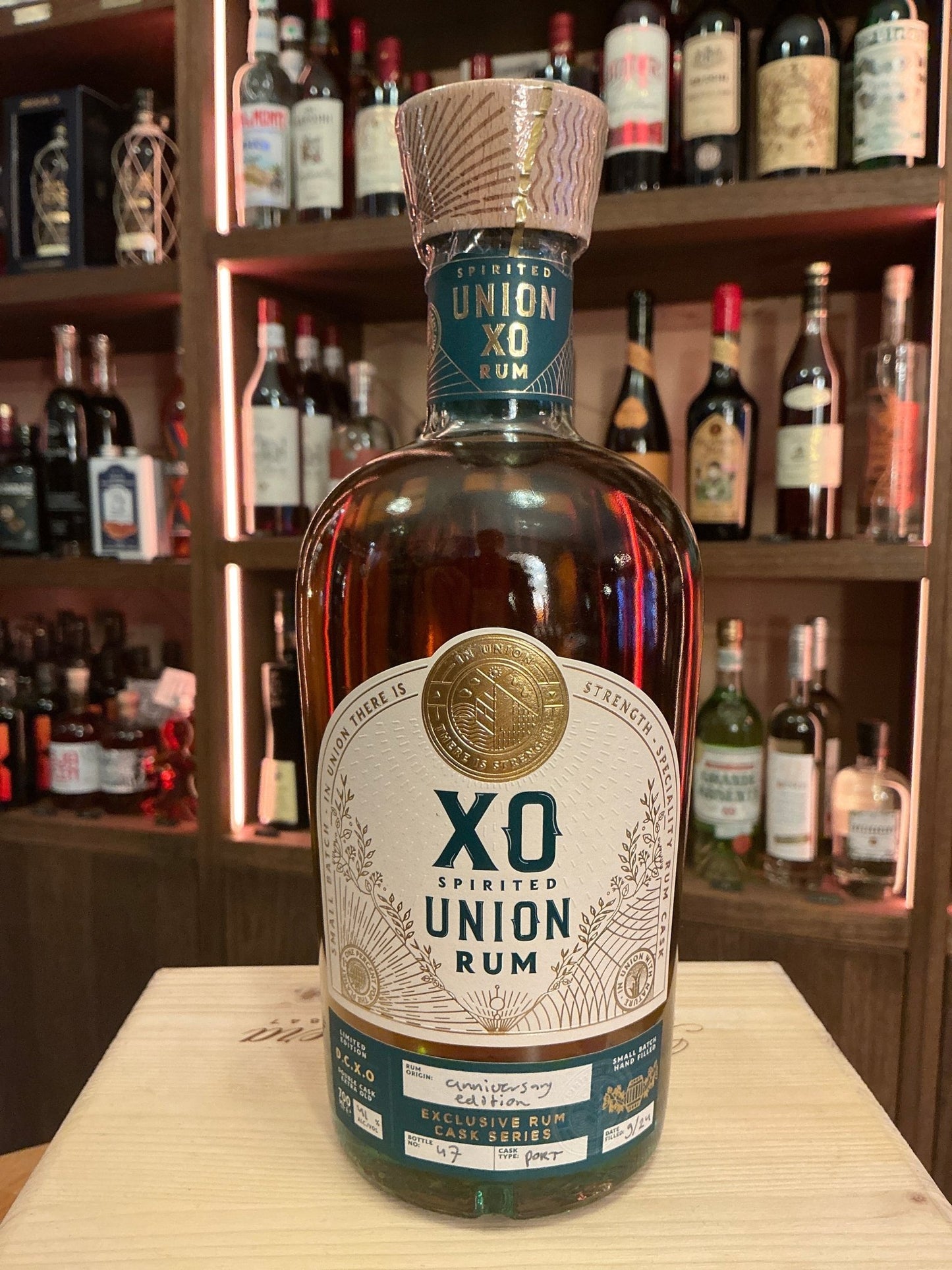 Spirited Union XO Anniversary Edition 10 Year aged rum bottle with artisan label and gold medallion, premium small batch.