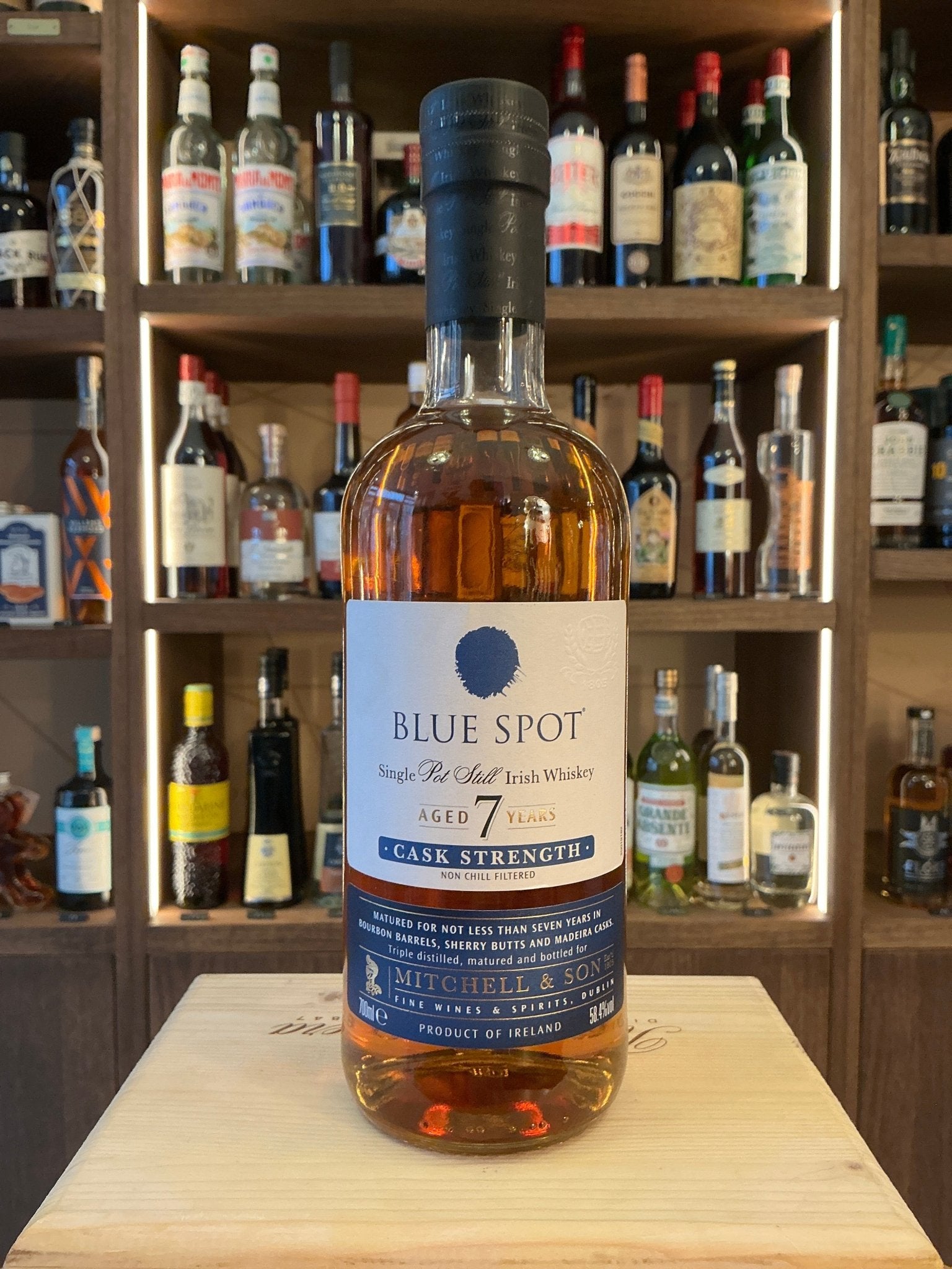 Blue Spot 7-Year-Old Irish Small Batch Whisky bottle with premium aged, distilled, artisan specialty spirits label and.