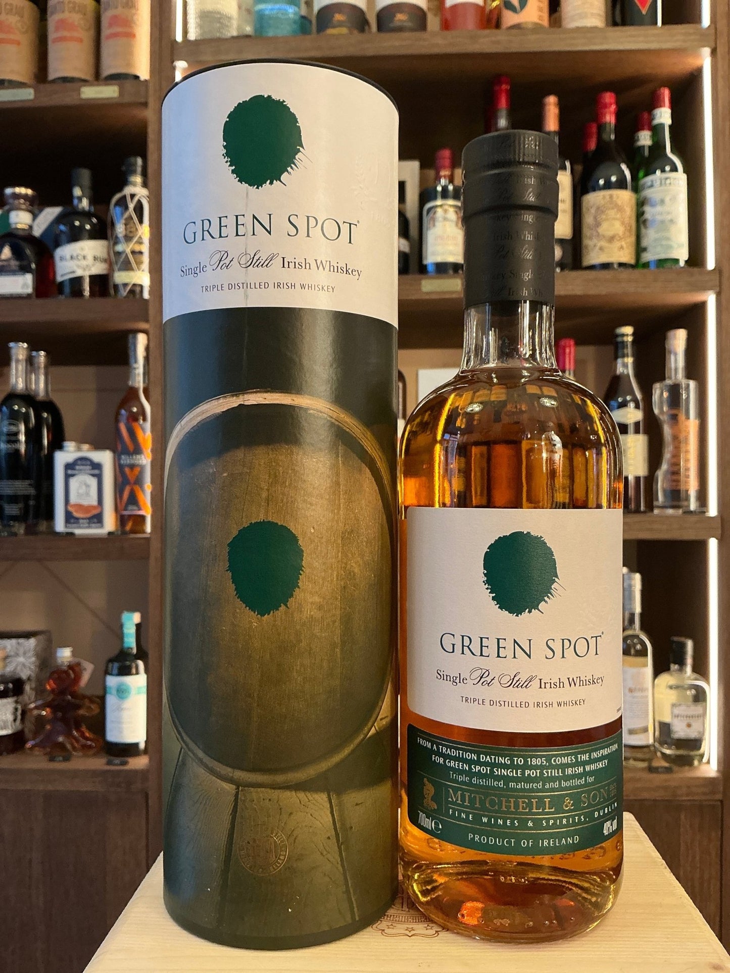 Green Spot Irish single malt whisky bottle with green and white label, artisan small batch, premium aged spirit.