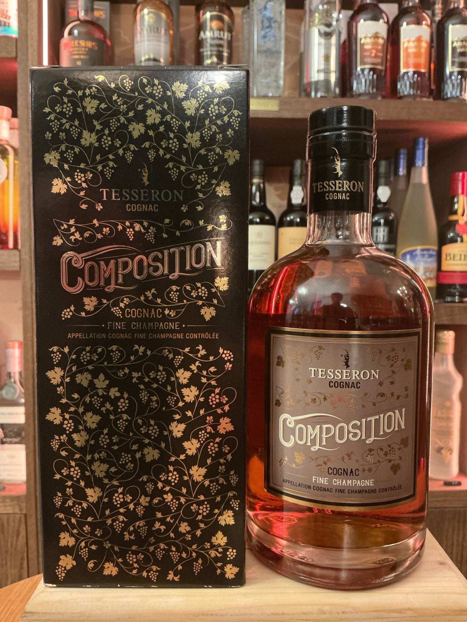 Tesseron Composition French Cognac bottle with matching black and gold floral box, premium aged brandy, artisan small batch.