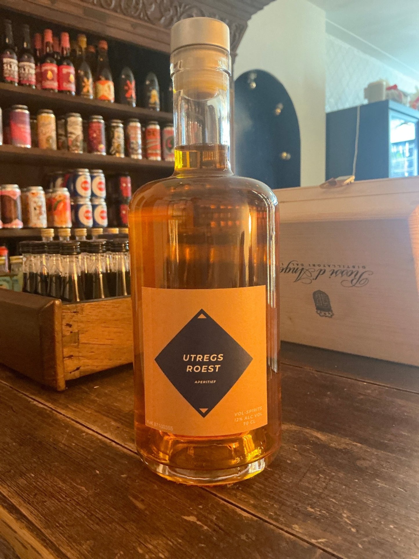 VOL-SPIRITS Utregst Roest herbal liqueur in clear glass bottle with wooden cork, amber spiced spirit, artisan Dutch small.