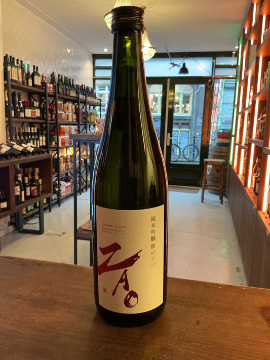 Zao Junmai Ginjo sake bottle with minimalist label, artisan small-batch premium distilled botanical spirit.